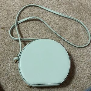 A new day sage green circle cross body bag